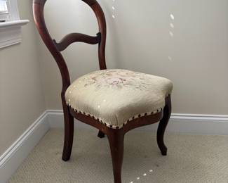 J51 - $40. Balloon Back Carved Wood Chair with Needlepoint Measures 18" W x 17" D x floor to seat 17" x 34" Tall.