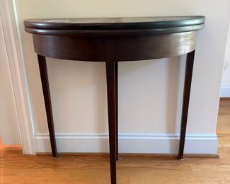 J96 - $85. Demi-Lune Flip Top Entry Table. Measures 32.25" W x 16" D x 30.5" Tall. Extended Top Measures 31.75" Diameter.