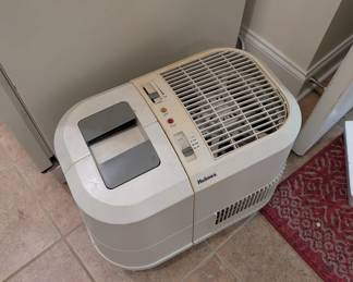 J39 - $50. Holmes Console Humidifier. 8 Gallon Output. Used in the box.