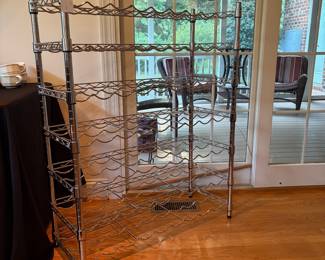 J114 - $35. Metal Wine Rack. Measures 35" w x 14" D x 44.5" Tall.
