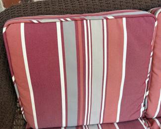 J162 - $95. Brown Resin Wicker Patio Love Seat and Table Set. In good condition with Allen and Roth Cushions that are weathered. . Loveseat Measures 50" W x 33" D x 34.5" Tall. Table Measures 42.5" W x 21.5" D x 16.5" Tall.