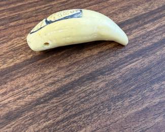 J193 - $60. Carved Whale Tooth.