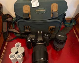 J57 - $150. Nikon N80 Camera. AF Nikkor 70 - 300 mm Lens. Nikkor 28 - 80 mm Lens. Camera is untested.
