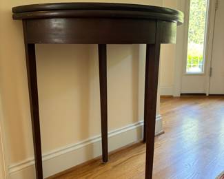J96 - $85. Demi-Lune Flip Top Entry Table. Measures 32.25" W x 16" D x 30.5" Tall. Extended Top Measures 31.75" Diameter.