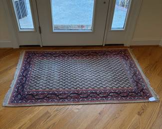 J98 - $125. Hand Woven 100% Virgin Lamb Wool Area Rug. Measures 64" x 39".