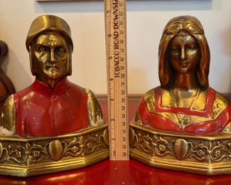J34 - $80. Vintage Dante & Beatrice Pompeian Solid Brass Bookends. Paint is chipping.