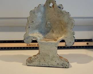 J118 - $60. Basket of Flowers Cast Iron Door Stop.