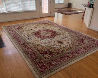 J84 - $75. Safavieh " Lyndhurst" Area Rug. Measures 8'3" x 11'. There were dogs in this home.