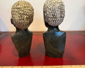 J33 - $20. African Hand Carved Stone Male and Female Busts. One has a chipped head.