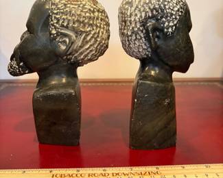 J33 - $20. African Hand Carved Stone Male and Female Busts. One has a chipped head.