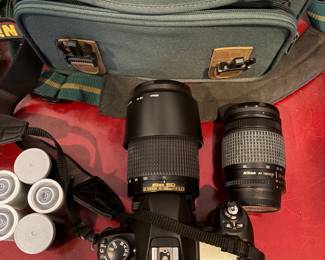 J57 - $150. Nikon N80 Camera. AF Nikkor 70 - 300 mm Lens. Nikkor 28 - 80 mm Lens. Camera is untested.