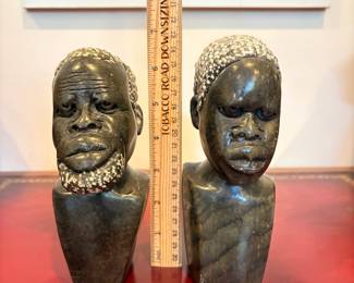 J33 - $20. African Hand Carved Stone Male and Female Busts. One has a chipped head.