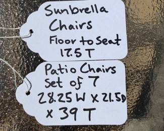 J64 - $275. 7 Sunbrella Patio Chairs. Measures 28.25" W x 21.5" D x floor to seat 17.5" x 39" Tall. Patio Table Measures 44" D x 28" Tall.