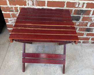 J166 - $10. Folding Side Table - top is weathered. Measures 20" x 18" x 21" tall.