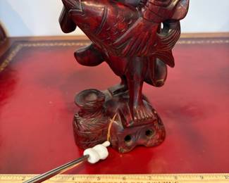 J28 - $30. Vintage Asian Fisherman Carved Red Wood. Cracked at the base.