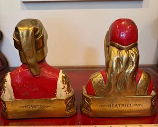 J34 - $80. Vintage Dante & Beatrice Pompeian Solid Brass Bookends. Paint is chipping.