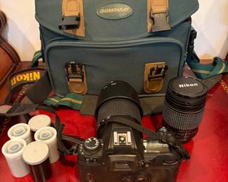 J57 - $150. Nikon N80 Camera. AF Nikkor 70 - 300 mm Lens. Nikkor 28 - 80 mm Lens. Camera is untested.