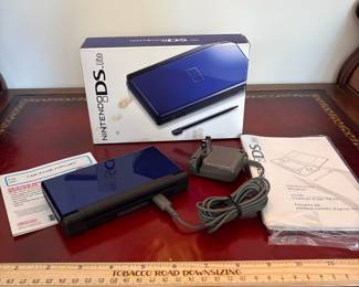 J26 - $100. Nintendo DS Lite Cobalt Blue with Box, Charger and Manuals. Like New.