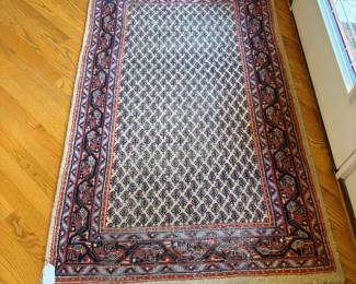 J98 - $125. Hand Woven 100% Virgin Lamb Wool Area Rug. Measures 64" x 39".