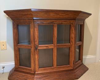J71 - $60. Vintage Lighted Curio Cabinet. Measures 41.5" x 14.25" x 30.25".