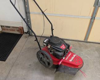 J158 - $175. CRAFTSMAN ST 120 159cc string mower.