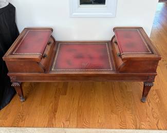 J160 - $150. Vintage Double-Sided Captain's or Partners" Bench Table with Leather Tops. Measures 45.5" W x 21.5" D x 19.75" Tall.