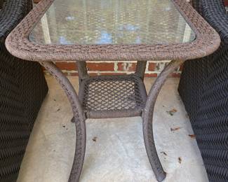 J163 - $30. Brown Resin Wicker Patio Side Table. Measures 21.5" W x 21.5" D x 24.5" Tall.