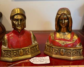 J34 - $80. Vintage Dante & Beatrice Pompeian Solid Brass Bookends. Paint is chipping.