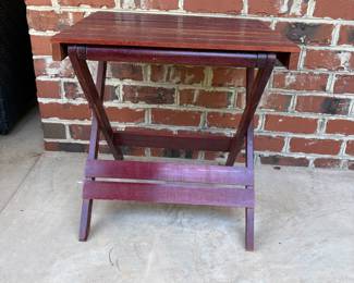 J166 - $10. Folding Side Table - top is weathered. Measures 20" x 18" x 21" tall.