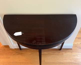 J96 - $85. Demi-Lune Flip Top Entry Table. Measures 32.25" W x 16" D x 30.5" Tall. Extended Top Measures 31.75" Diameter.