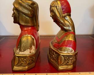 J34 - $80. Vintage Dante & Beatrice Pompeian Solid Brass Bookends. Paint is chipping.