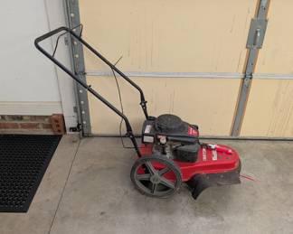 J158 - $175. CRAFTSMAN ST 120 159cc string mower.