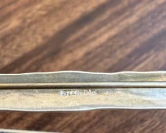 J198 - $30. Sterling Arrow Brooch.