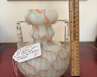 J11 - $25. Vintage Victorian Herringbone Satin Art Glass Vase. Chips on the top and bottom of one handle.
