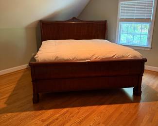 J132 - $350. King Sleigh Bed by Pulaski Furniture. Clean Mattress & Box Spring included if you want them! Measures 81" W x 88" L x 62" Tall.