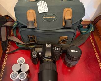 J57 - $150. Nikon N80 Camera. AF Nikkor 70 - 300 mm Lens. Nikkor 28 - 80 mm Lens. Camera is untested.