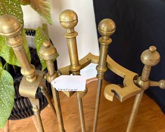 J93 - $35. Vintage Set of Brass Fireplace Tools with Stand. Measures 11" W x 10.5" D x 28.75" Tall.