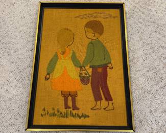 J182 - $25. Framed Needlepoint. Measures 17" x 24" framed.