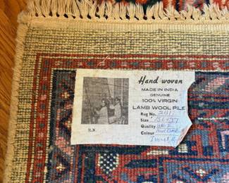 J98 - $125. Hand Woven 100% Virgin Lamb Wool Area Rug. Measures 64" x 39".