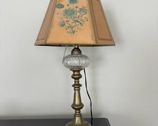 J202 - $35. Brass and Glass Table Lamp with Floral Painted Paper Lamp Shade. Measures 19.5" Tall. Shade has discoloration.