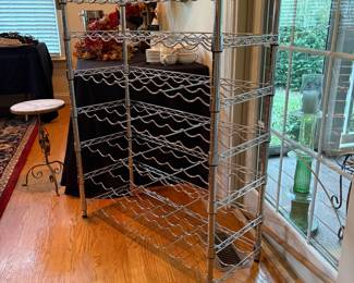 J114 - $35. Metal Wine Rack. Measures 35" w x 14" D x 44.5" Tall.
