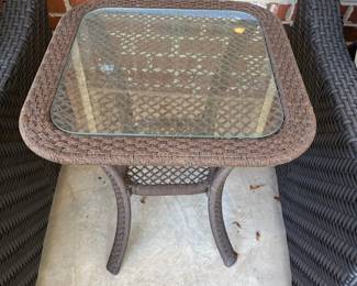J163 - $30. Brown Resin Wicker Patio Side Table. Measures 21.5" W x 21.5" D x 24.5" Tall.