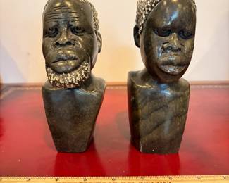 J33 - $20. African Hand Carved Stone Male and Female Busts. One has a chipped head.