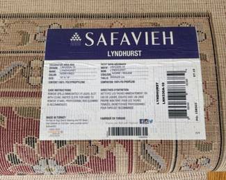 J84 - $75. Safavieh " Lyndhurst" Area Rug. Measures 8'3" x 11'. There were dogs in this home.
