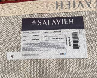J85 - $75. Safavieh Area Rug "Heritage Collection". Measures 8'3" x 11'. This is a dog friendly home!