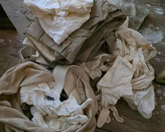 528 assortedwhiteandkhakifabricclothing