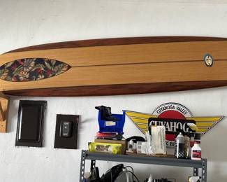 Surfboard and misc wall hangings