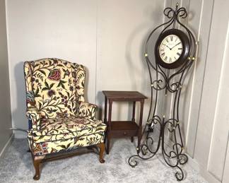 Upholstered Armchair With Antique Side Table, Contemporary Clock