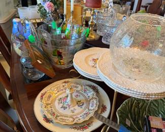 Dining Room table filled with china, decoratives, bowls, plates and MORE