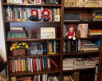 Mahogany book cases, filled with books